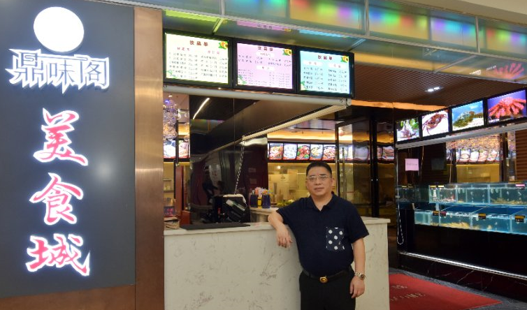 执行会长罗渊略（海口鼎味阁美食城）